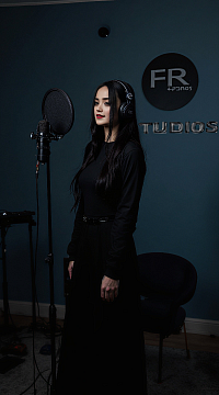 Sky Sweeney in a music recording studio. Famous Reflections Studios
